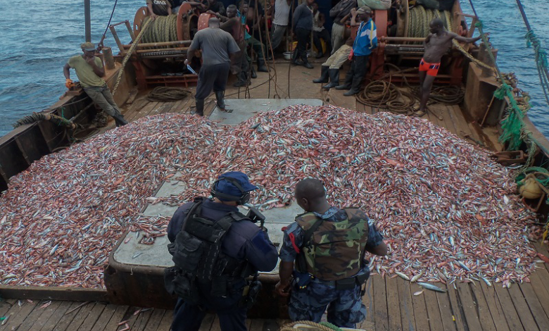 A U.S. Coast Guard law enforcement detachment member and a Ghanaian navy sailor inspect a fishing vessel suspected of illegal fishing during the Africa Maritime Law Enforcement Partnership (U.S. Navy photo by Kwabena Akuamoah-Boateng/Released) culled from https://kasapafmonline.com/2017/05/ghana-outdoor-watchdog-committees-clamp-illegal-fishing/