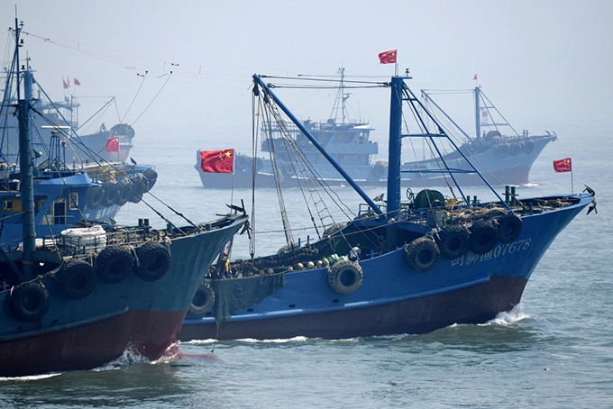 Chinese fishing boat departing from Shoshiba central fishing port, Photo courtesy of Kyodo News Agency