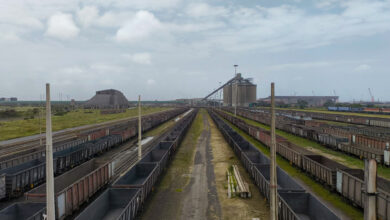 Empty coal trucks at Richard’s Bay. CREDIT: Oliver Stallwood
